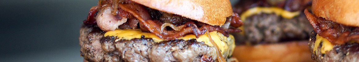 Eating Burger Greek Mediterranean at Vassi's Drive-In restaurant in Hellertown, PA.